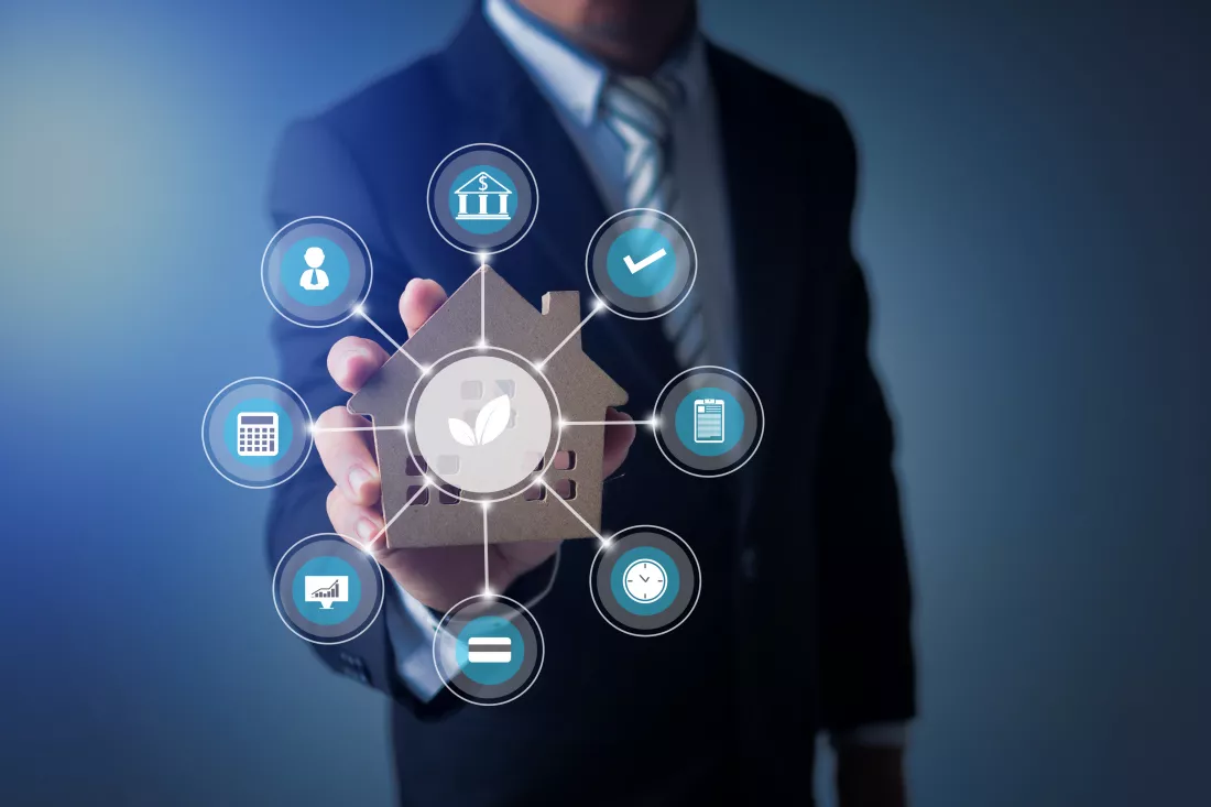 businessman-show-smart-home-model-building-with-responsible-environment