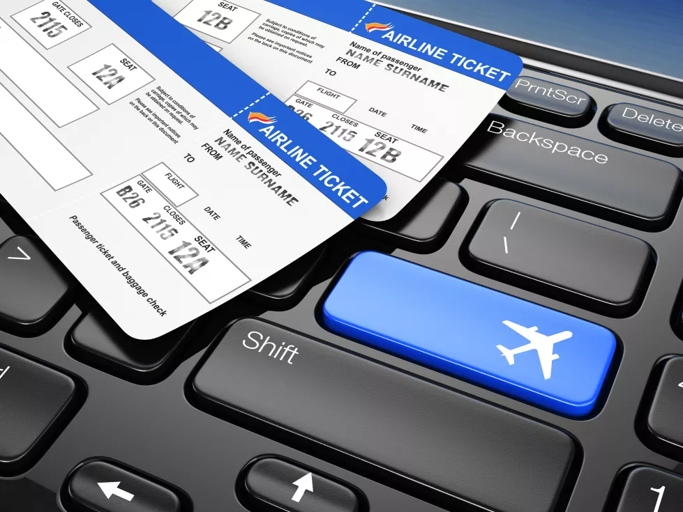 online-booking-airplane-tickets-laptop-keyboard-3d